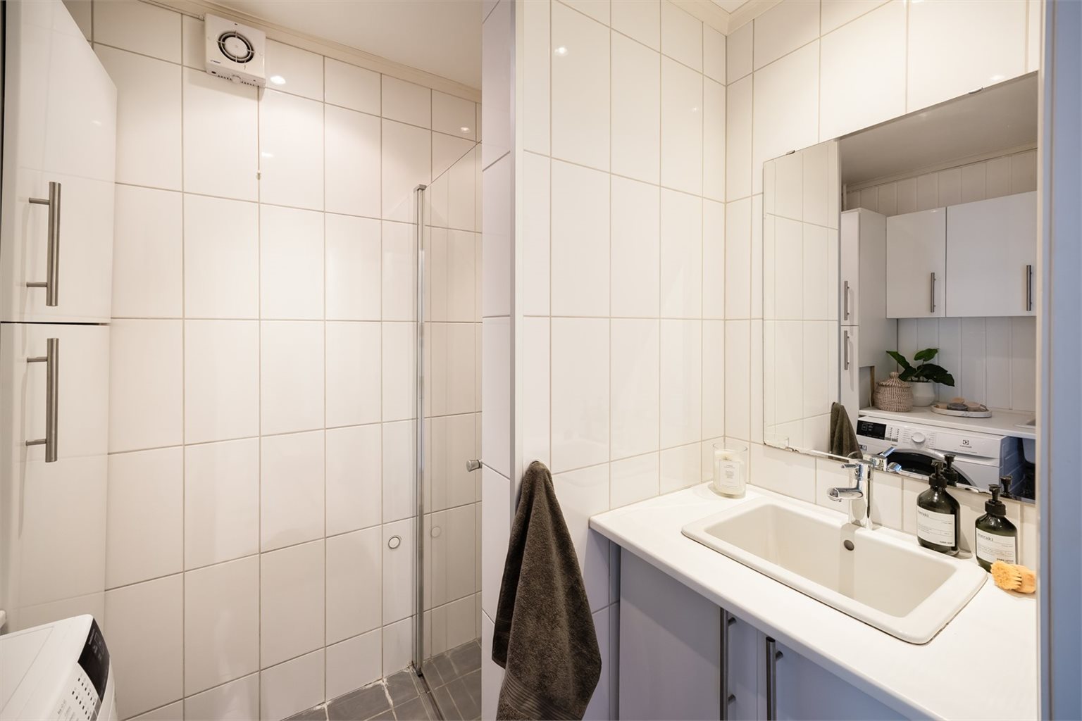 Flislagt bad på 4 m² med gulvvarme.